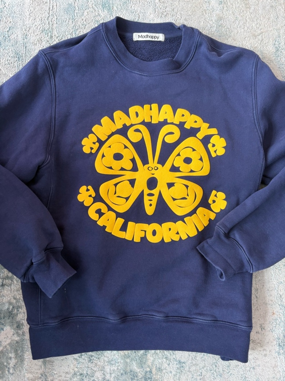 Madhappy Navy Sweatshirt with Yellow Butterfly Graphic